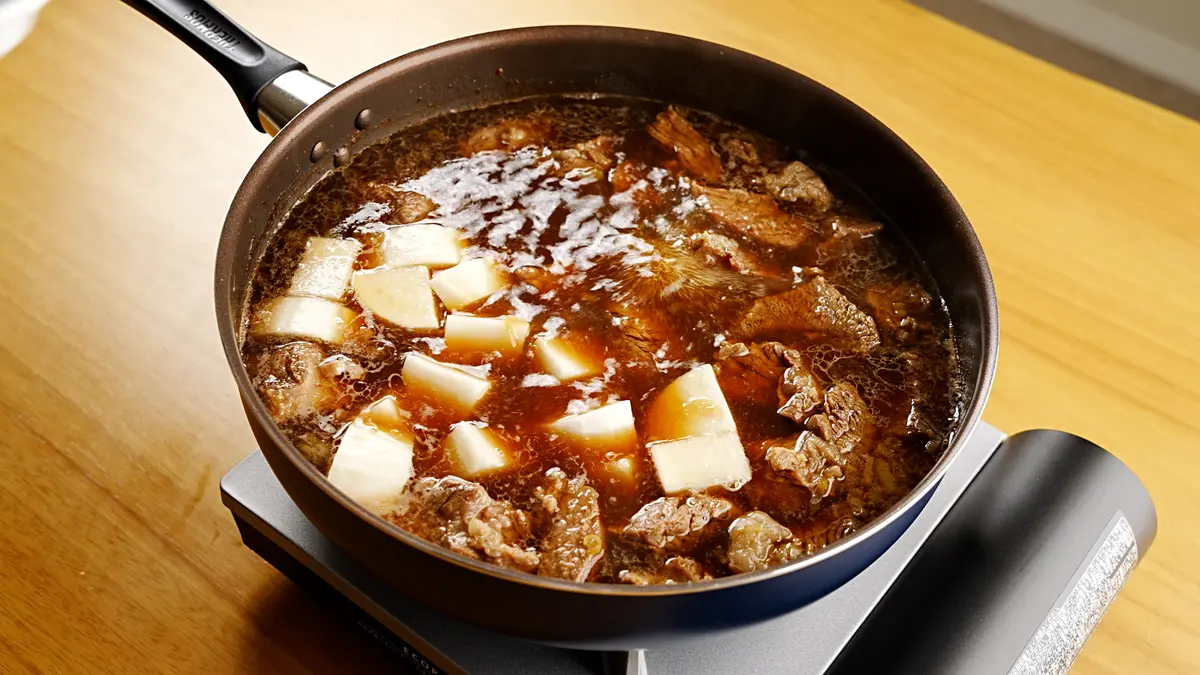 大根と玉ねぎを加えた様子